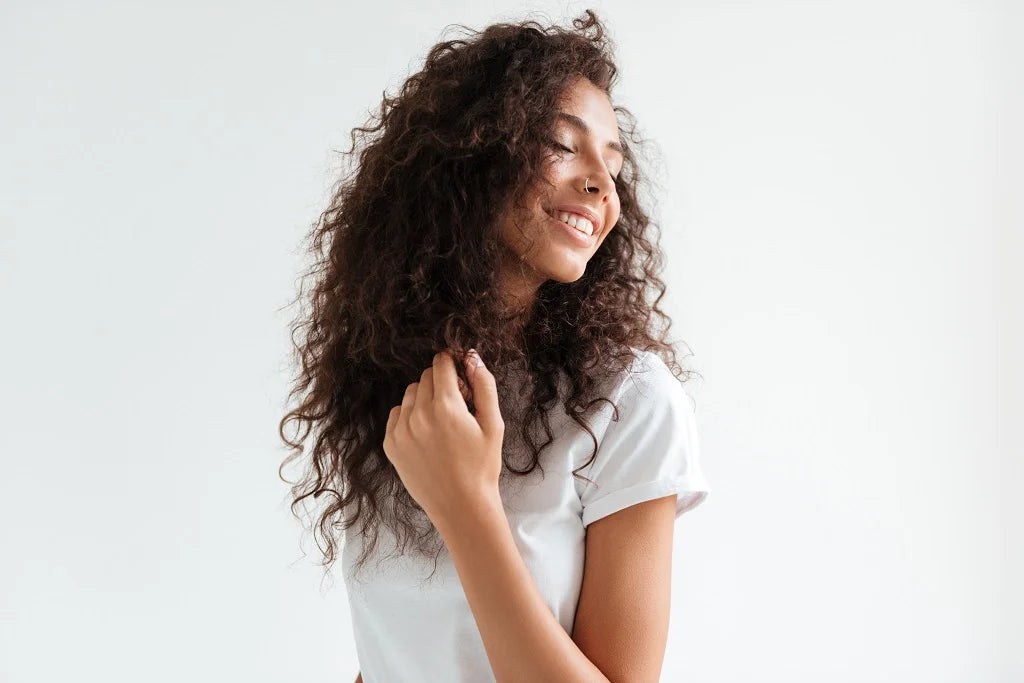 Layered Cut or Blunt Cut: Which Is Best For Your Curls? | ThriveCo ...